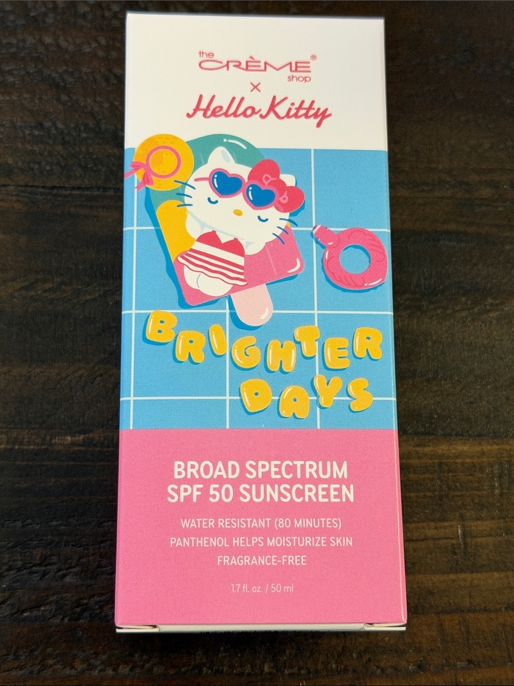 the Crème Shop x Hello Kitty Broad Spectrum SPF 50 Sunscreen - Pink